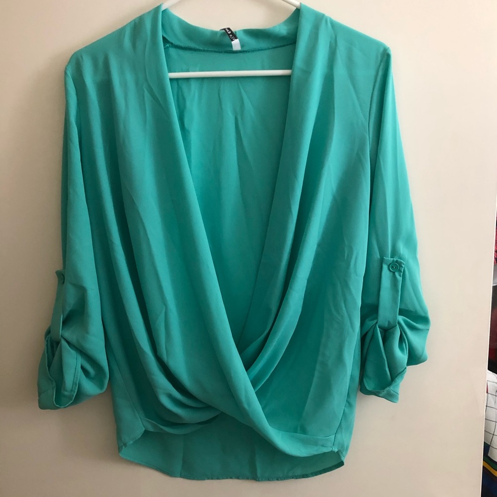 Brand new teal blouse